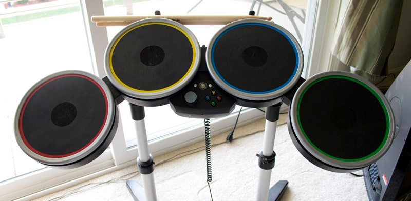 Illustration for article titled Rock Band 2 Wireless Guitar and Drums Hardware Review